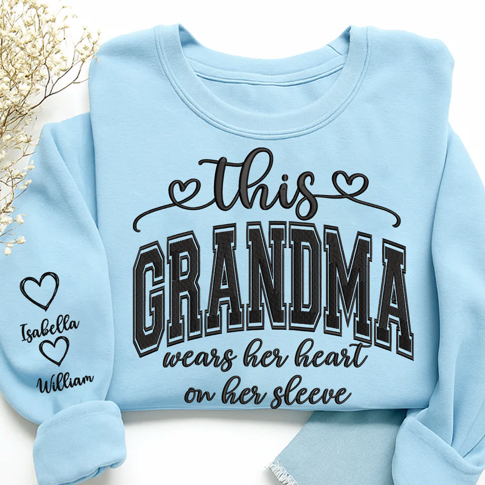 Embroidered This Grandma Wears Her Heart On Her Sleeve Shirt with Grandkids’ Names, Custom Gift for Grandma Sweatshirt