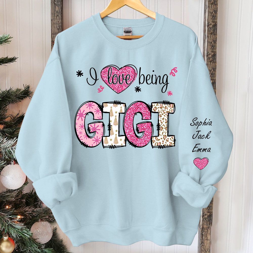 I love being Gigi Pink Christmas And Grandkids Sweatshirt