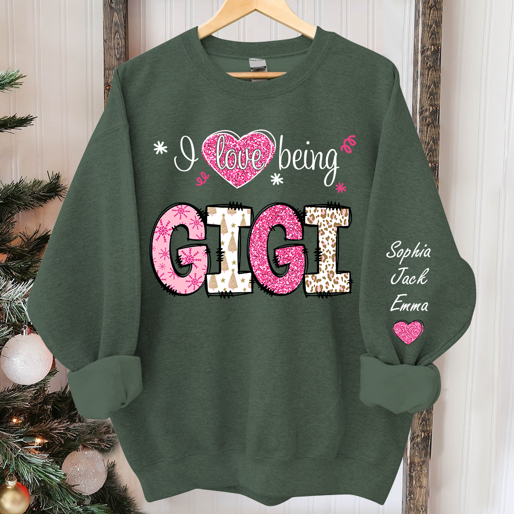I love being Gigi Pink Christmas And Grandkids Sweatshirt