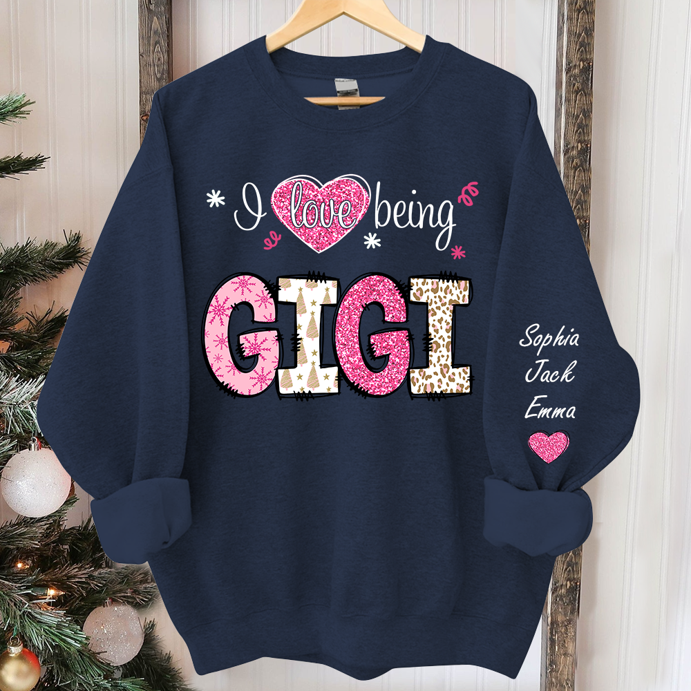 I love being Gigi Pink Christmas And Grandkids Sweatshirt