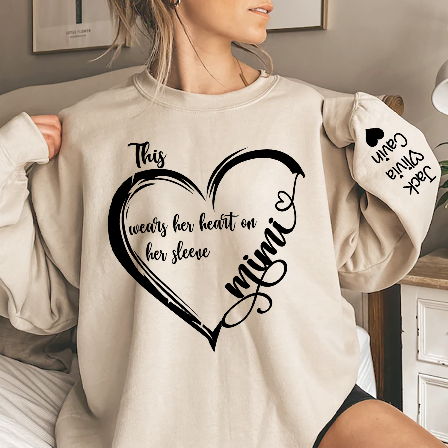 Personalized Grandma Heart Sweatshirt, Custom Mom This Grandma Wears Her Heart On Her Sleeve With Grandkids Sweatshirt