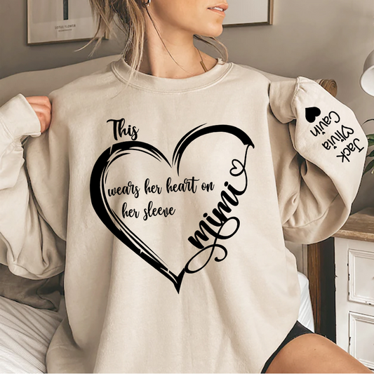 Personalized Grandma Heart Sweatshirt, Custom Mom This Grandma Wears Her Heart On Her Sleeve With Grandkids Sweatshirt
