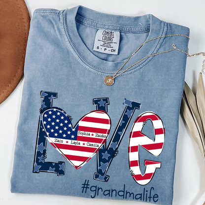 Personalized Grandma Life T-Shirt - LOVE American Flag Heart Design - Custom Grandkids’ Names - USA Patriotic Gift for Proud Grandmothers - Soft Comfort Colors Tee