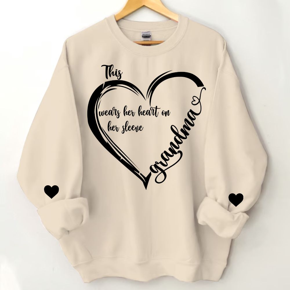 Personalized Grandma Heart Sweatshirt, Custom Mom This Grandma Wears Her Heart On Her Sleeve With Grandkids Sweatshirt