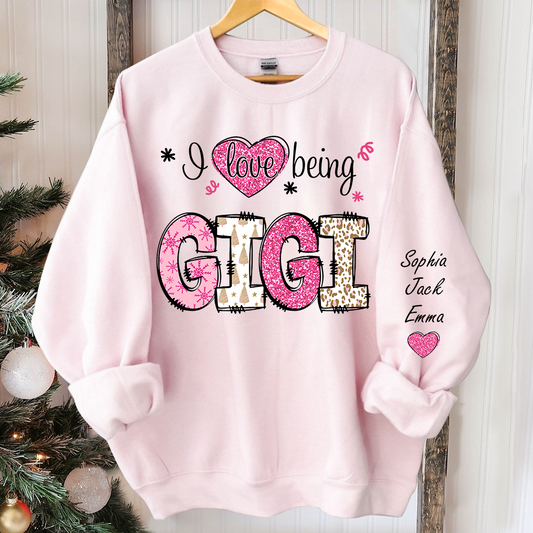I love being Gigi Pink Christmas And Grandkids Sweatshirt
