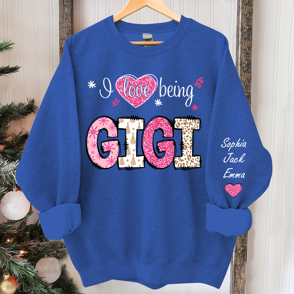 I love being Gigi Pink Christmas And Grandkids Sweatshirt