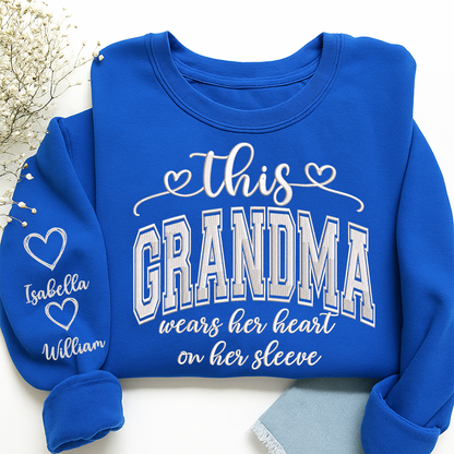 Embroidered This Grandma Wears Her Heart On Her Sleeve Shirt with Grandkids’ Names, Custom Gift for Grandma Sweatshirt