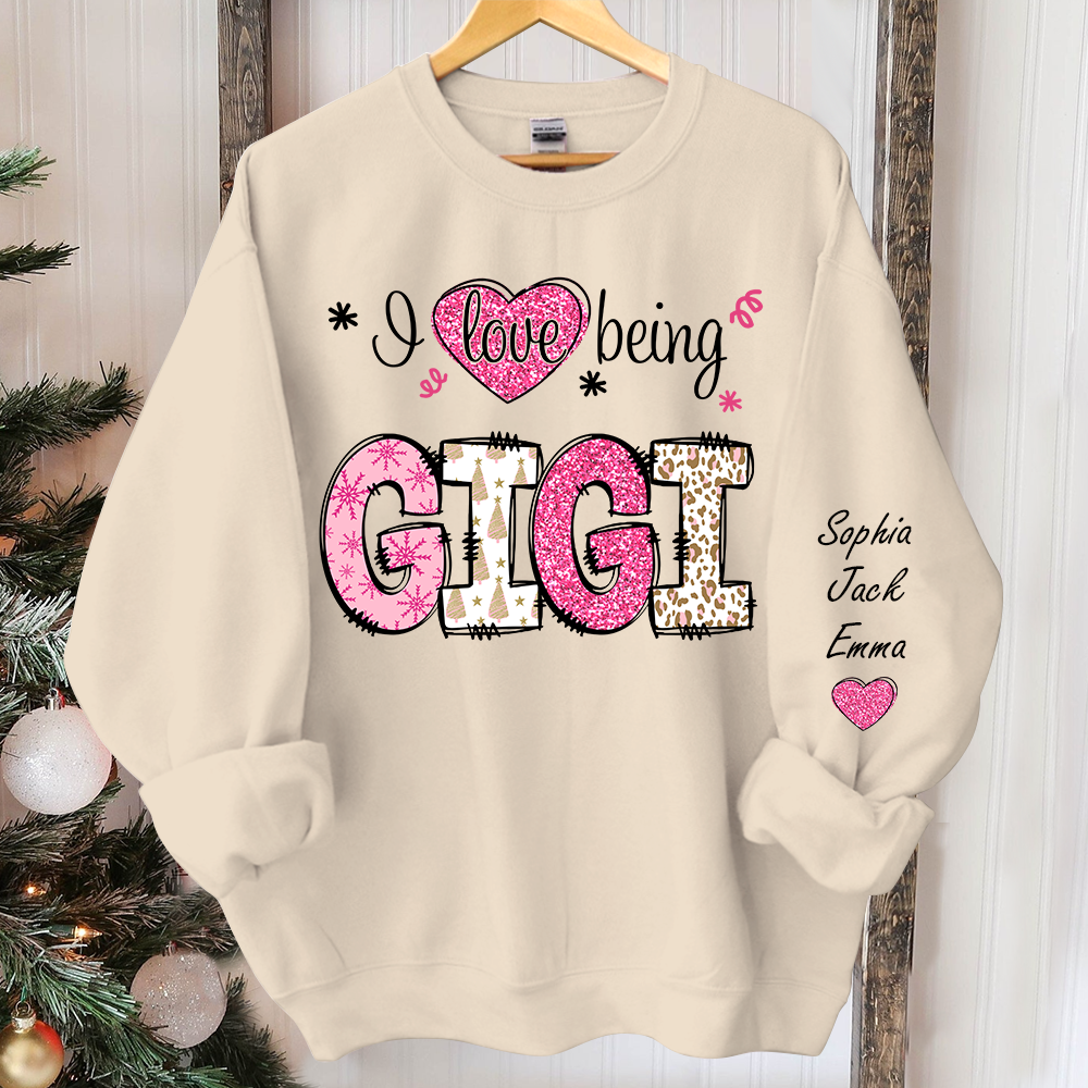 I love being Gigi Pink Christmas And Grandkids Sweatshirt