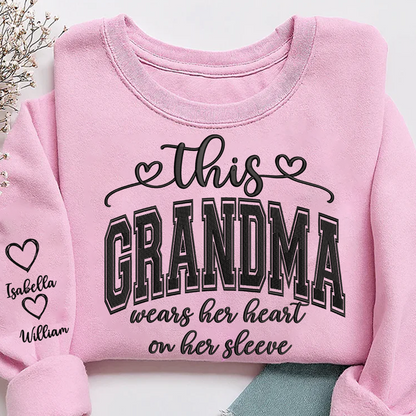 Embroidered This Grandma Wears Her Heart On Her Sleeve Shirt with Grandkids’ Names, Custom Gift for Grandma Sweatshirt