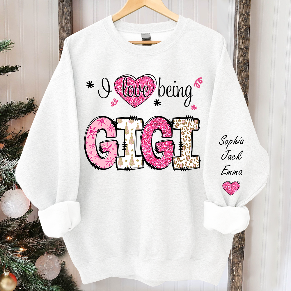 I love being Gigi Pink Christmas And Grandkids Sweatshirt